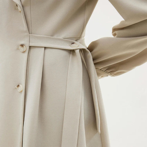 Double-breasted khaki office dress with puff sleeves