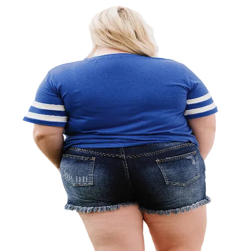 Person wearing a blue shirt with white stripes 