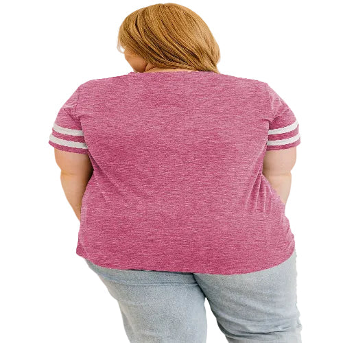 Person wearing a pink short-sleeve shirt 