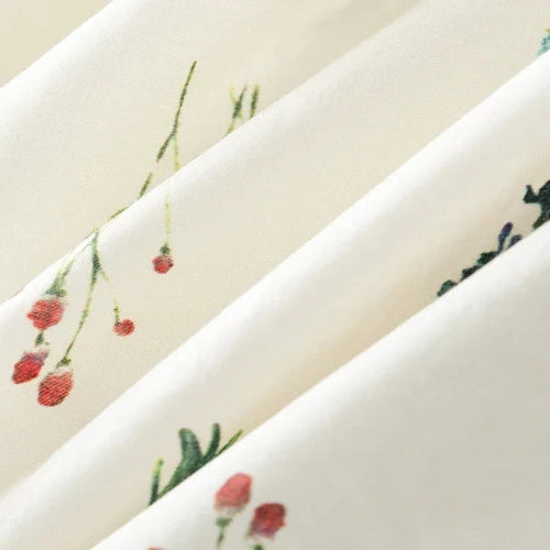 Sleeveless empire waist floral dress
