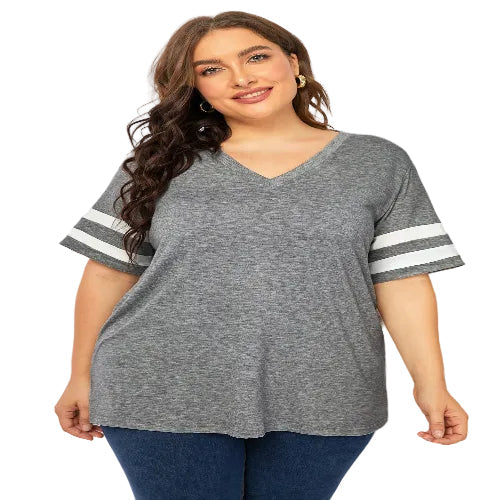 Woman wearing a gray V-neck t-shirt 