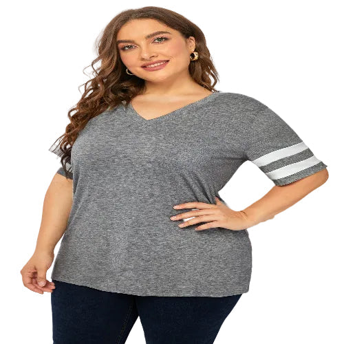 Woman wearing a gray t-shirt with white sleeves 