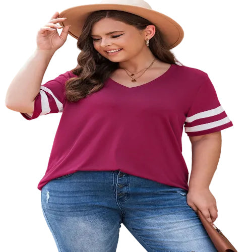 Woman wearing a maroon t-shirt with white sleeves