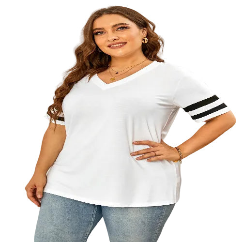 Woman wearing a white t-shirt with black stripes on sleeves against a neutral background