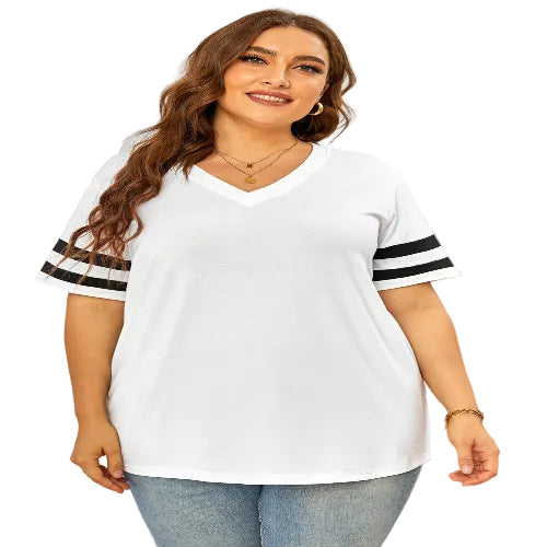 Woman wearing a white t-shirt with black stripes on sleeves against a neutral background